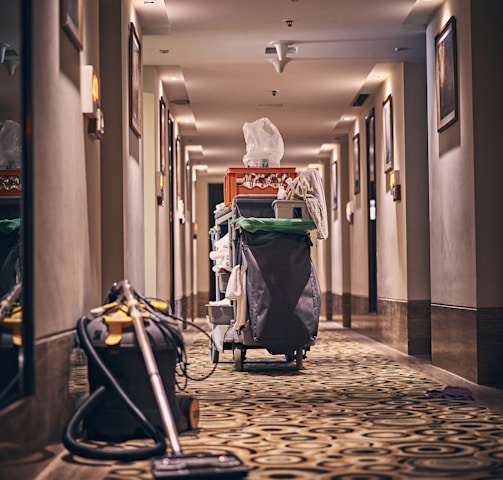 black and gray stroller on hallway