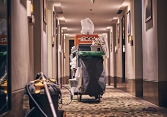 black and gray stroller on hallway