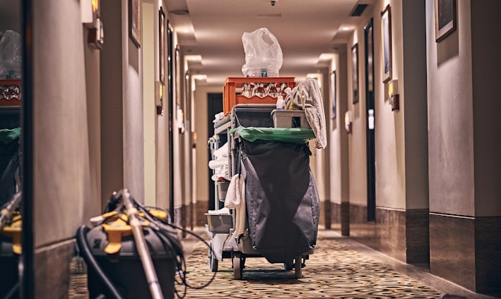 black and gray stroller on hallway