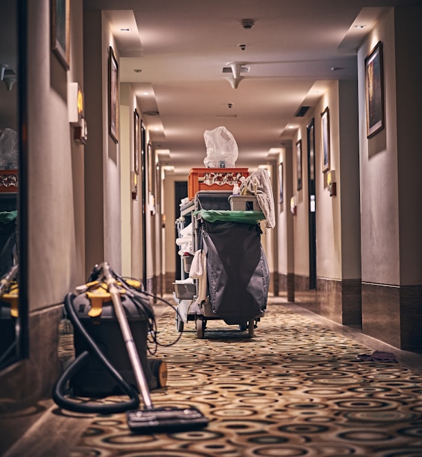 black and gray stroller on hallway