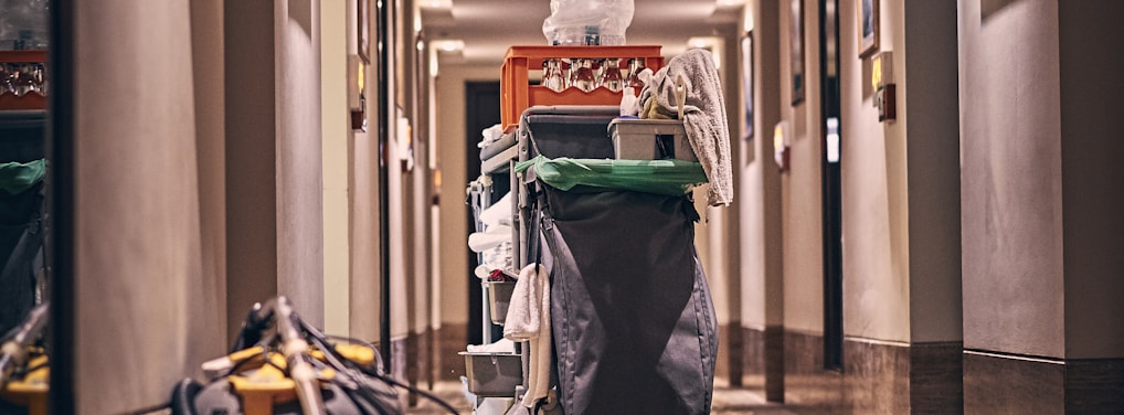 black and gray stroller on hallway