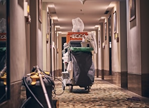 black and gray stroller on hallway