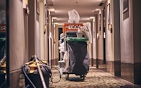 black and gray stroller on hallway