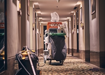 black and gray stroller on hallway
