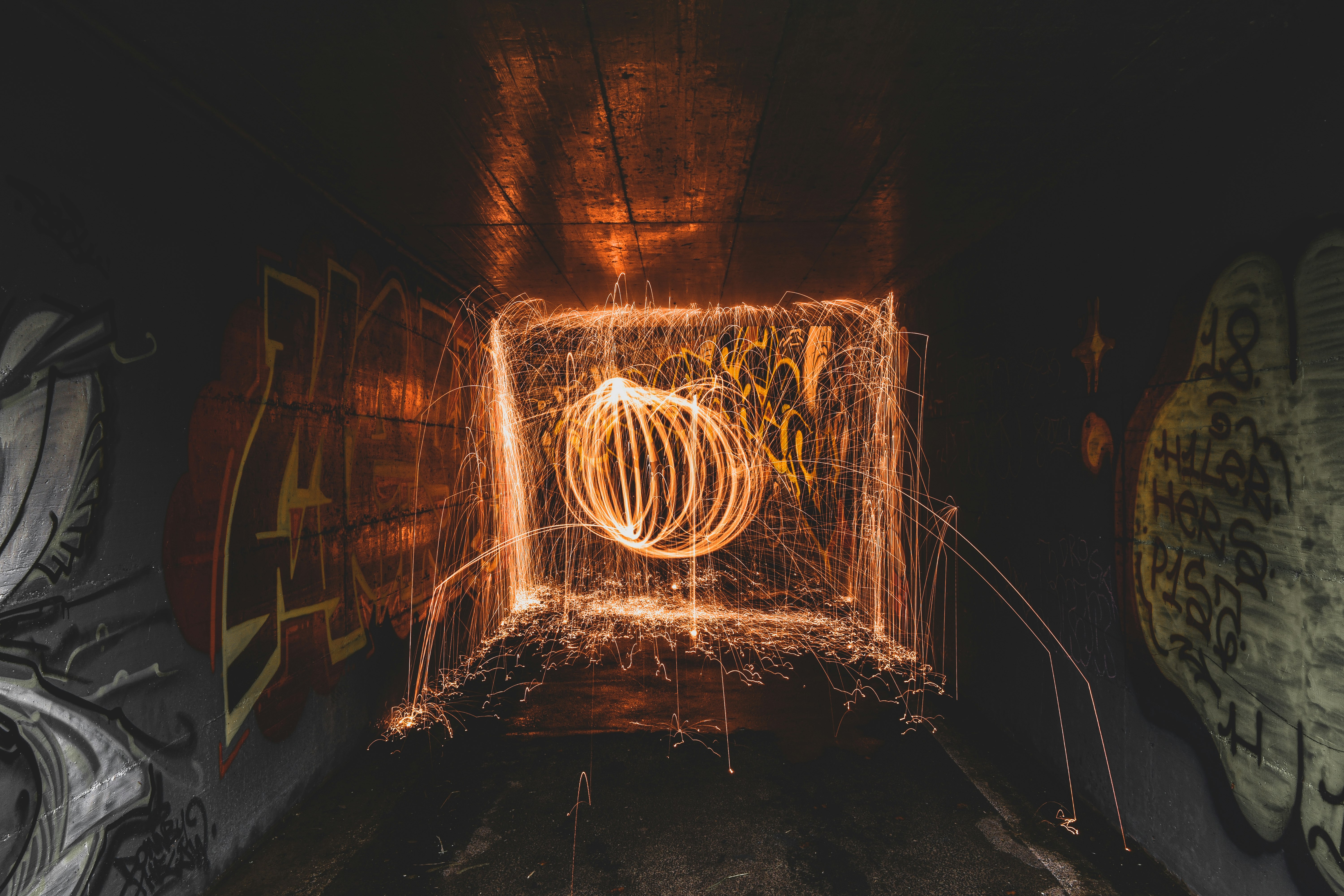 brown metal tunnel with light