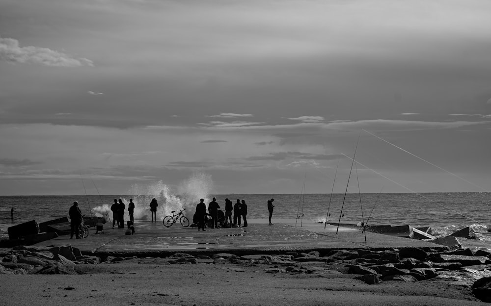 people walking on beach shore during daytime