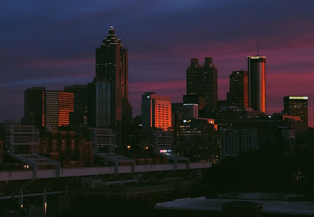 city skyline during night time