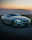 gray mercedes benz coupe on black asphalt road during daytime
