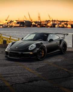 black porsche 911 on road during daytime