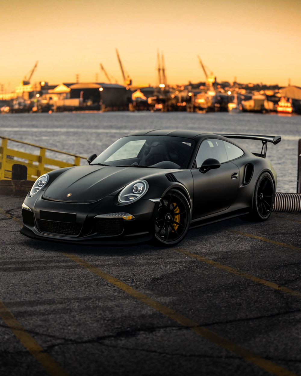 black porsche 911 on road during daytime