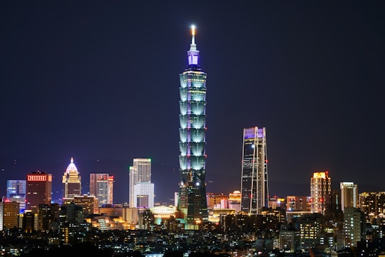 high rise building during night time in Xiangshan Hiking Trail Taiwan