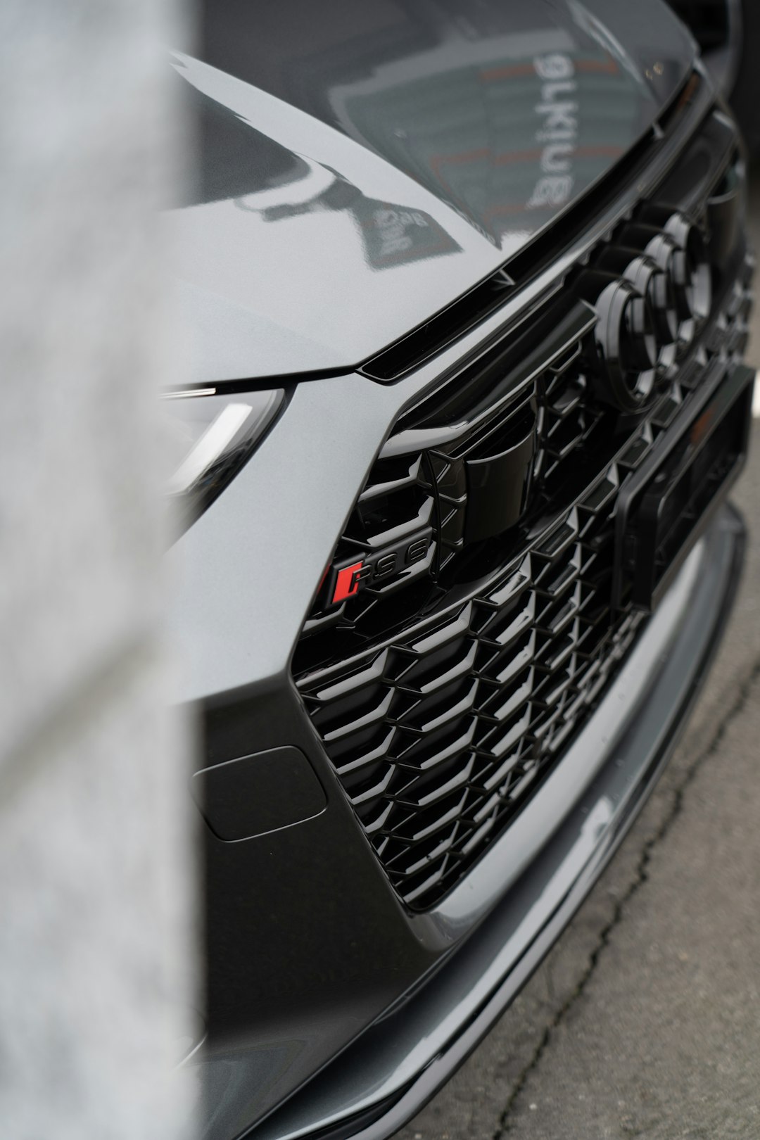 black bmw car in close up photography