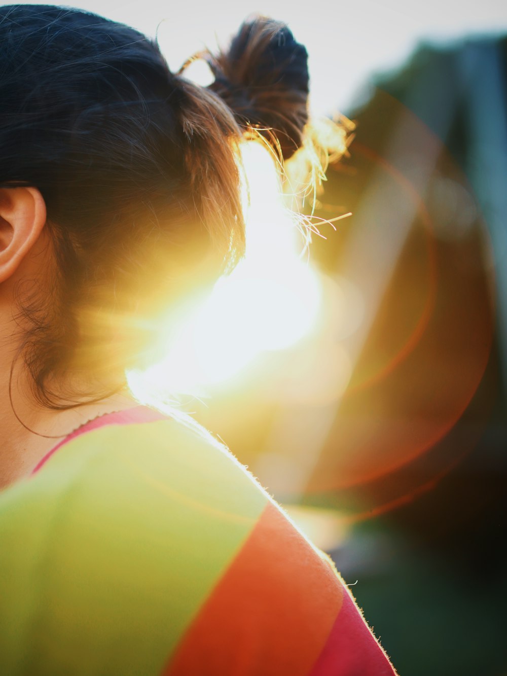 woman in yellow and red shirt