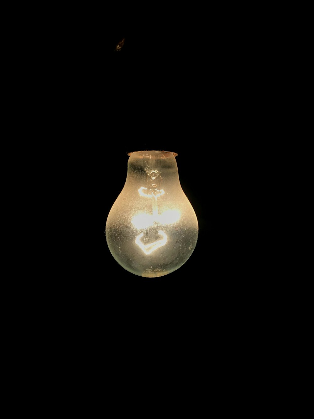 light bulb with black background