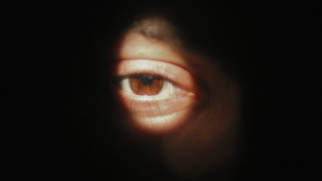 persons eye in close up photography