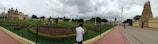 A panoramic shot of a grand Mughal garden with symmetrical water channels.