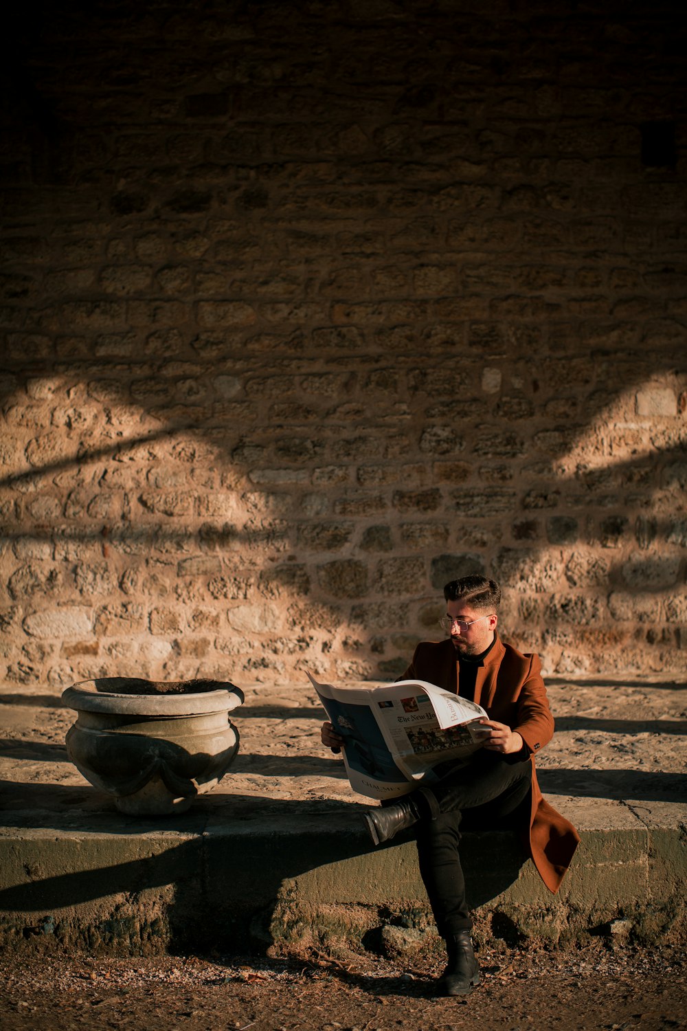 woman in red shirt reading book