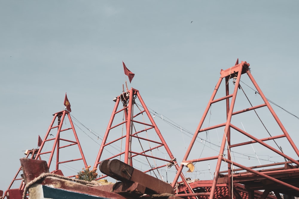 red metal tower under blue sky during daytime