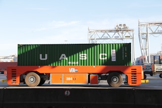 orange and green cargo truck