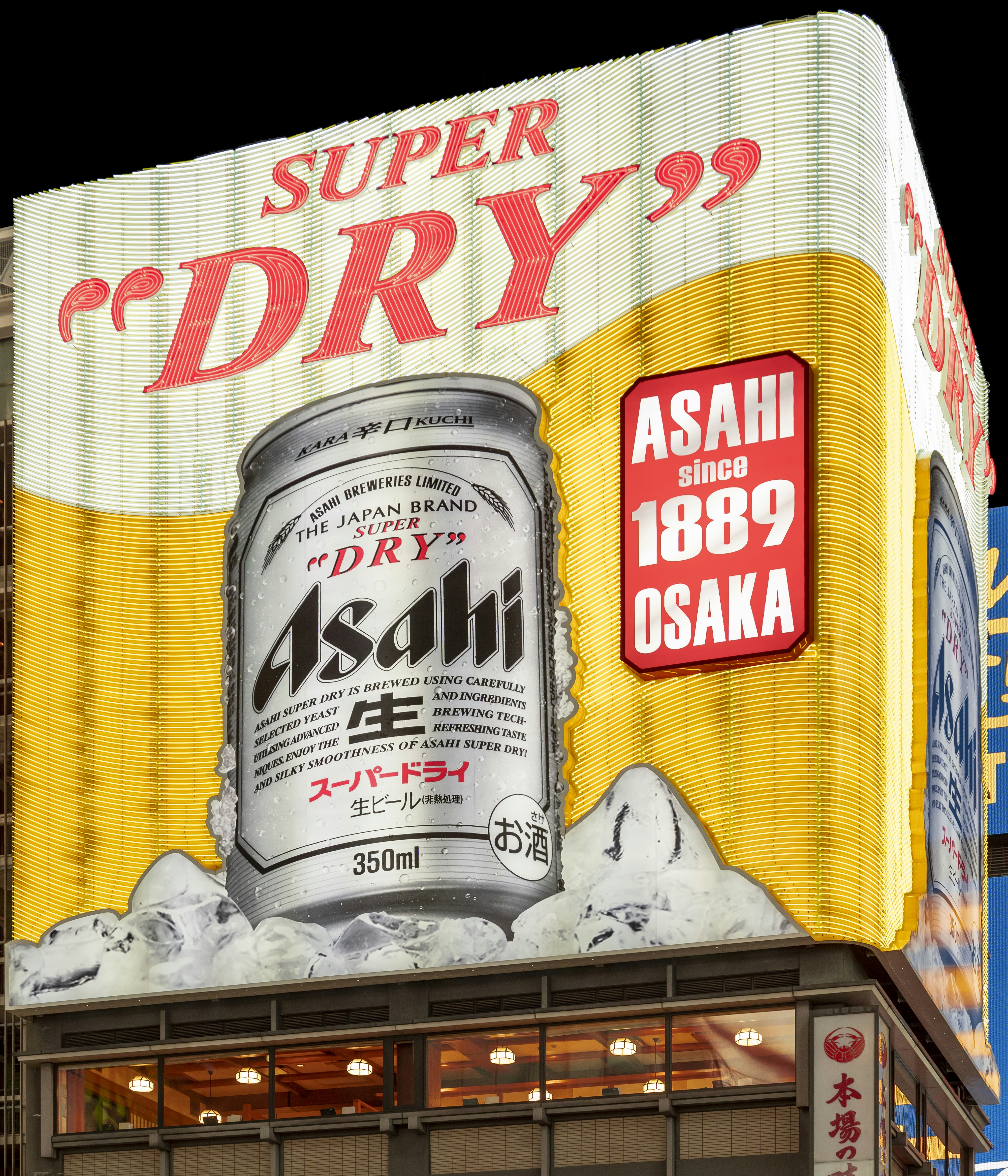 white and blue can on yellow and blue textile