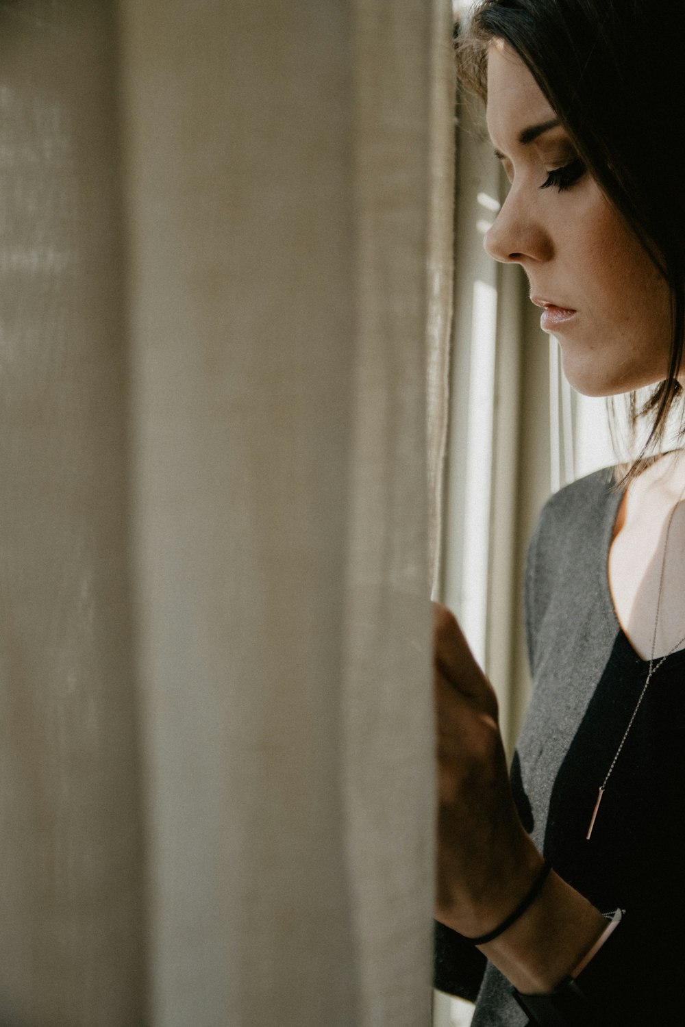 woman in black and white shirt