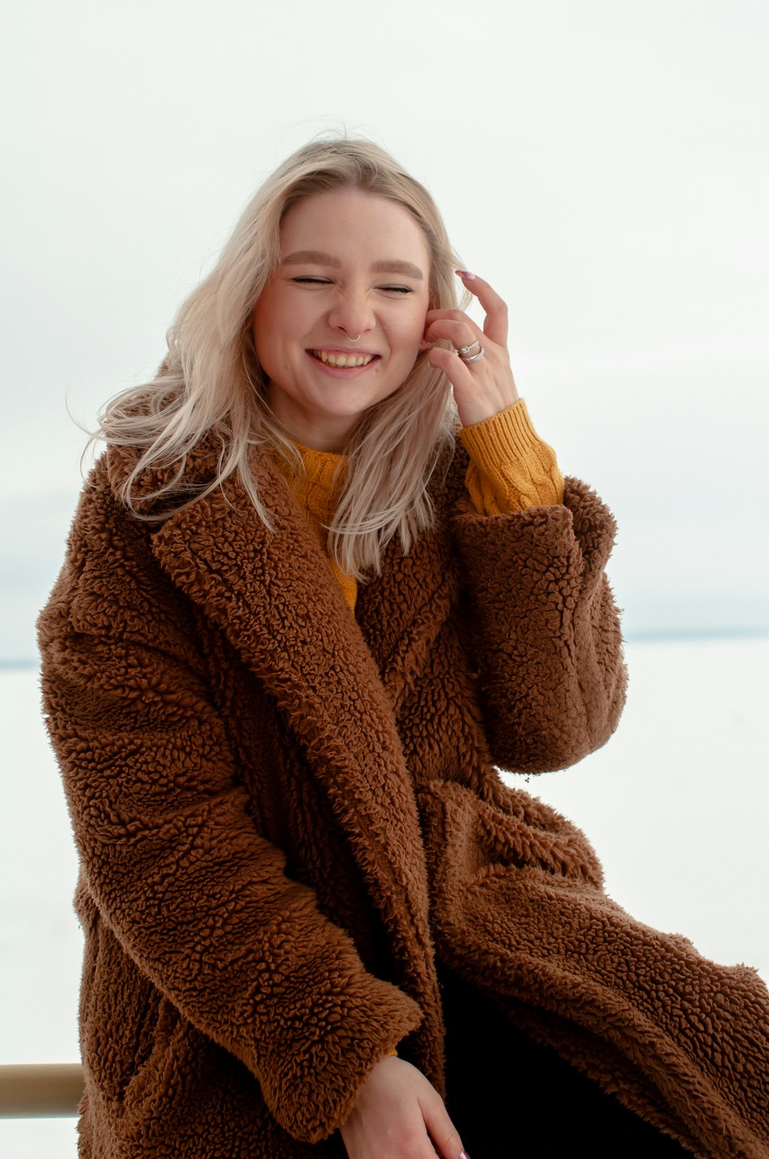 woman in brown fur coat