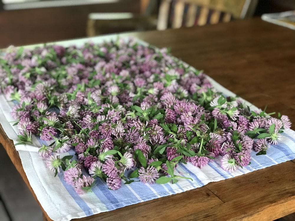 purple flowers on white and pink floral textile