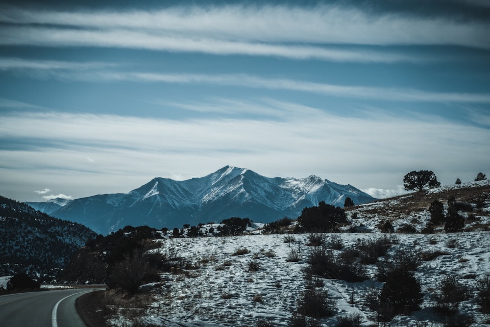 snow covered mountain under blue sky during daytime