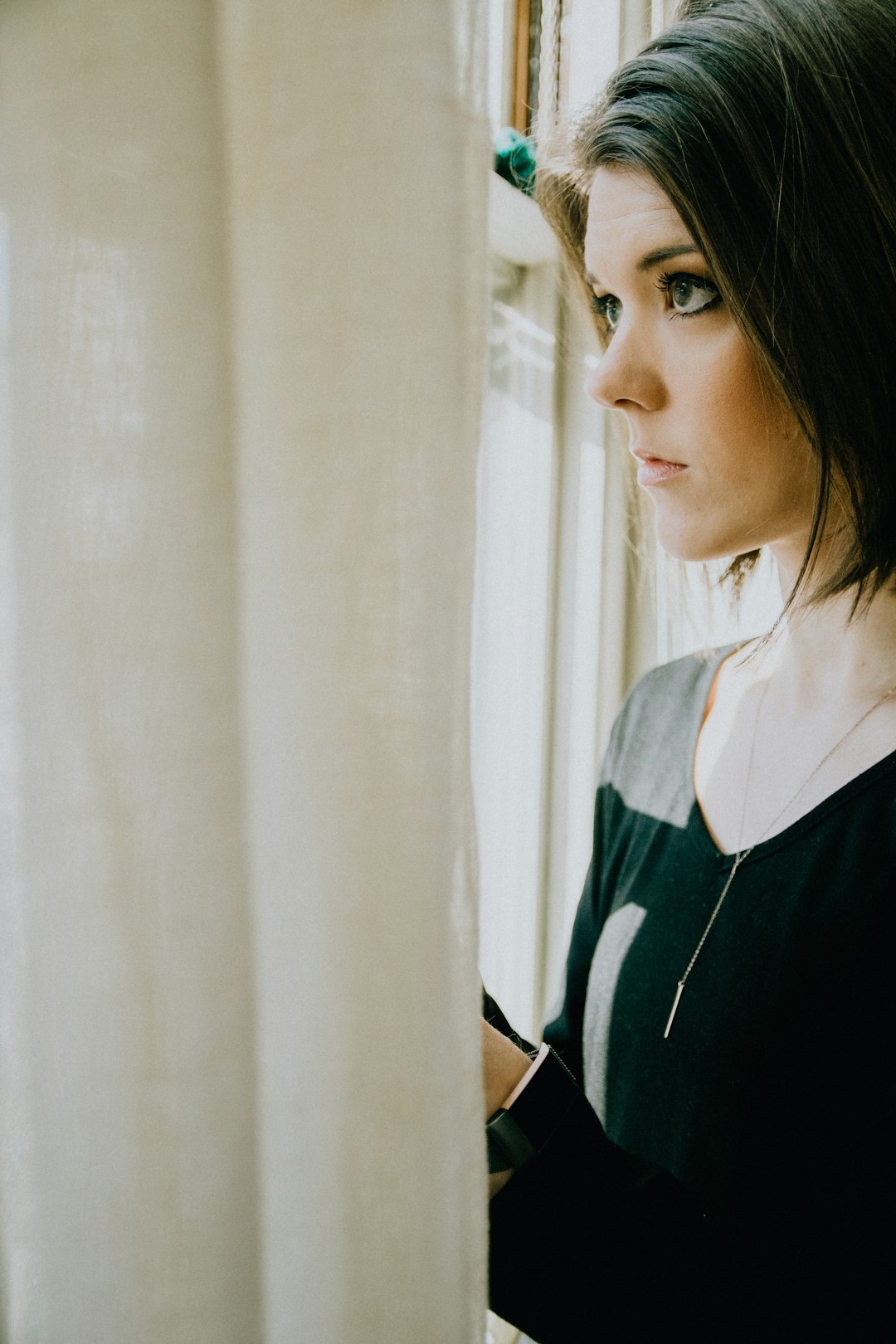 woman in black and white shirt