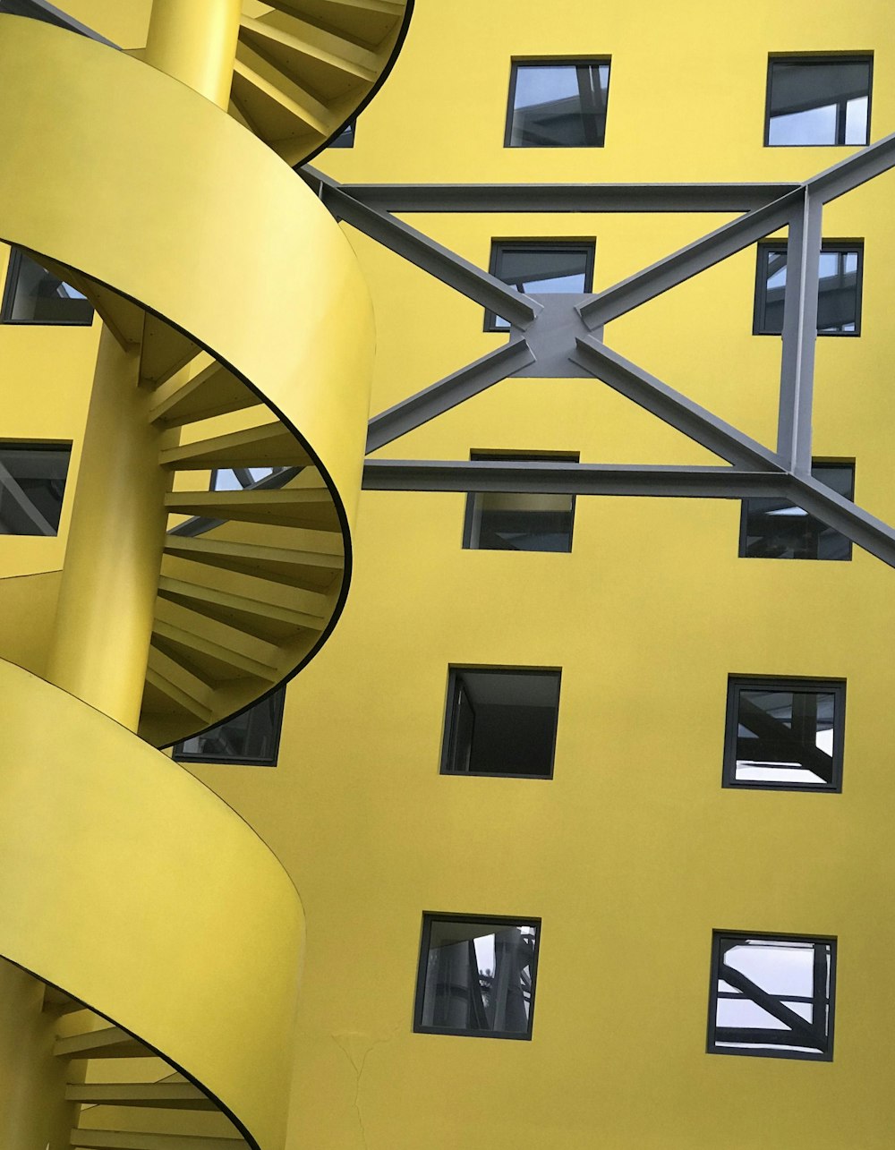yellow and black spiral staircase