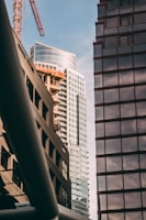 A time-lapse style photo showing the progression of a cityscape with new civil engineering developments.