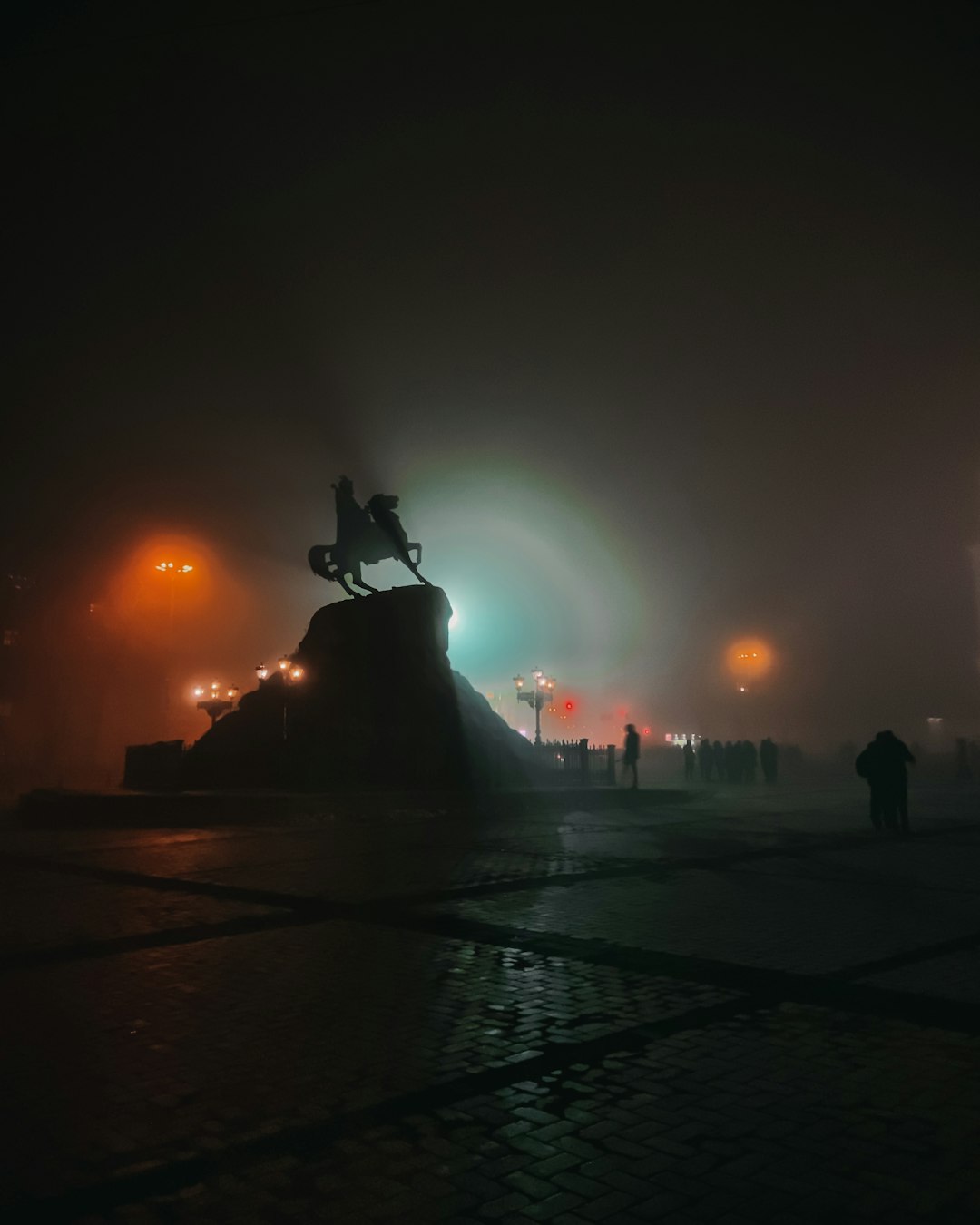 people walking on street during night time