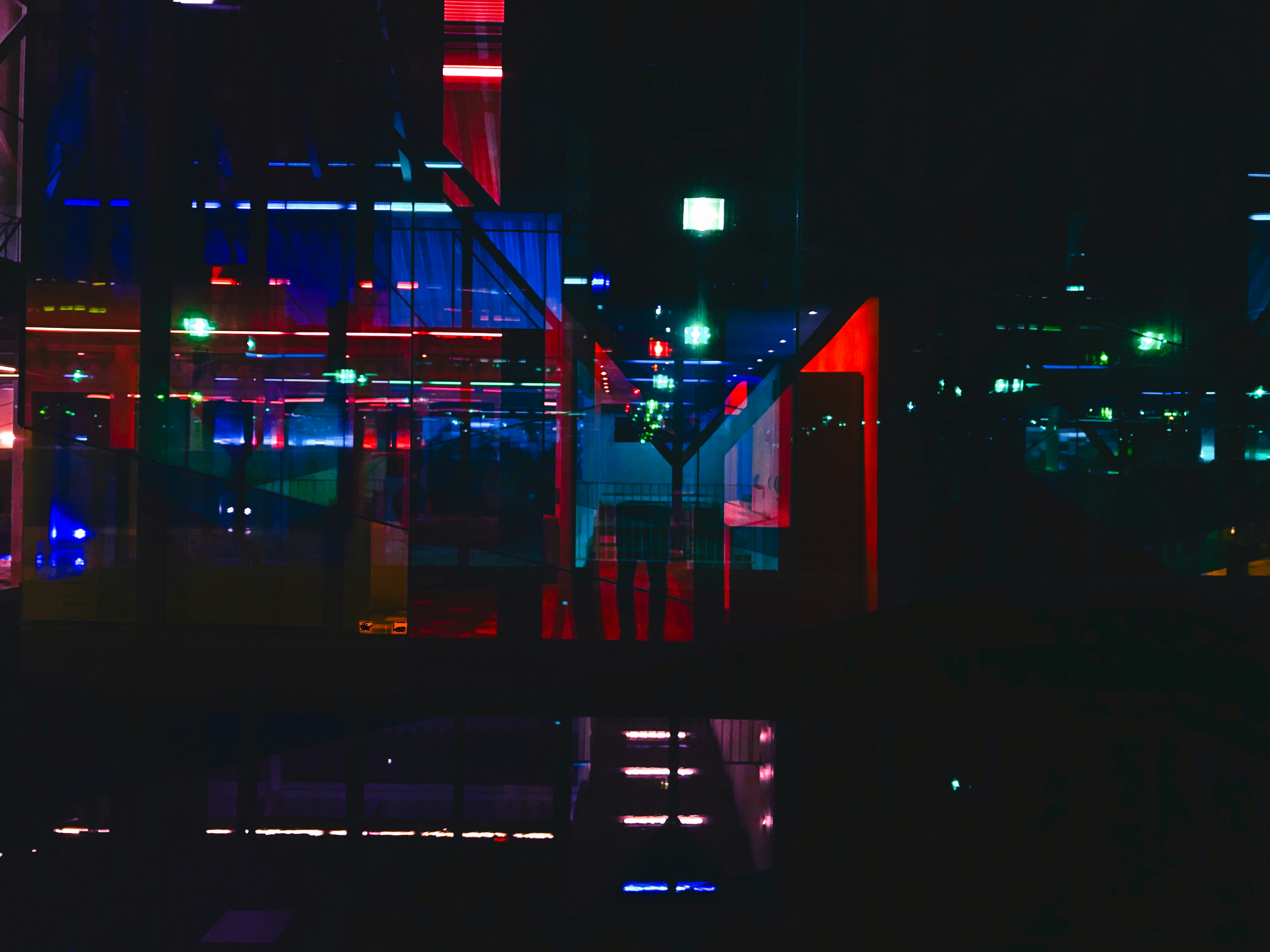 red and yellow lighted building during night time