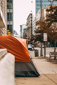 Film and TV production company: orange umbrella on a sidewalk during the daytime