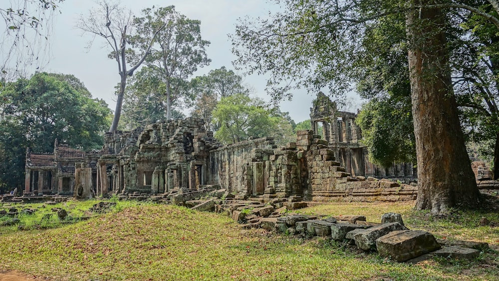 brown concrete ruins under white clouds during daytime