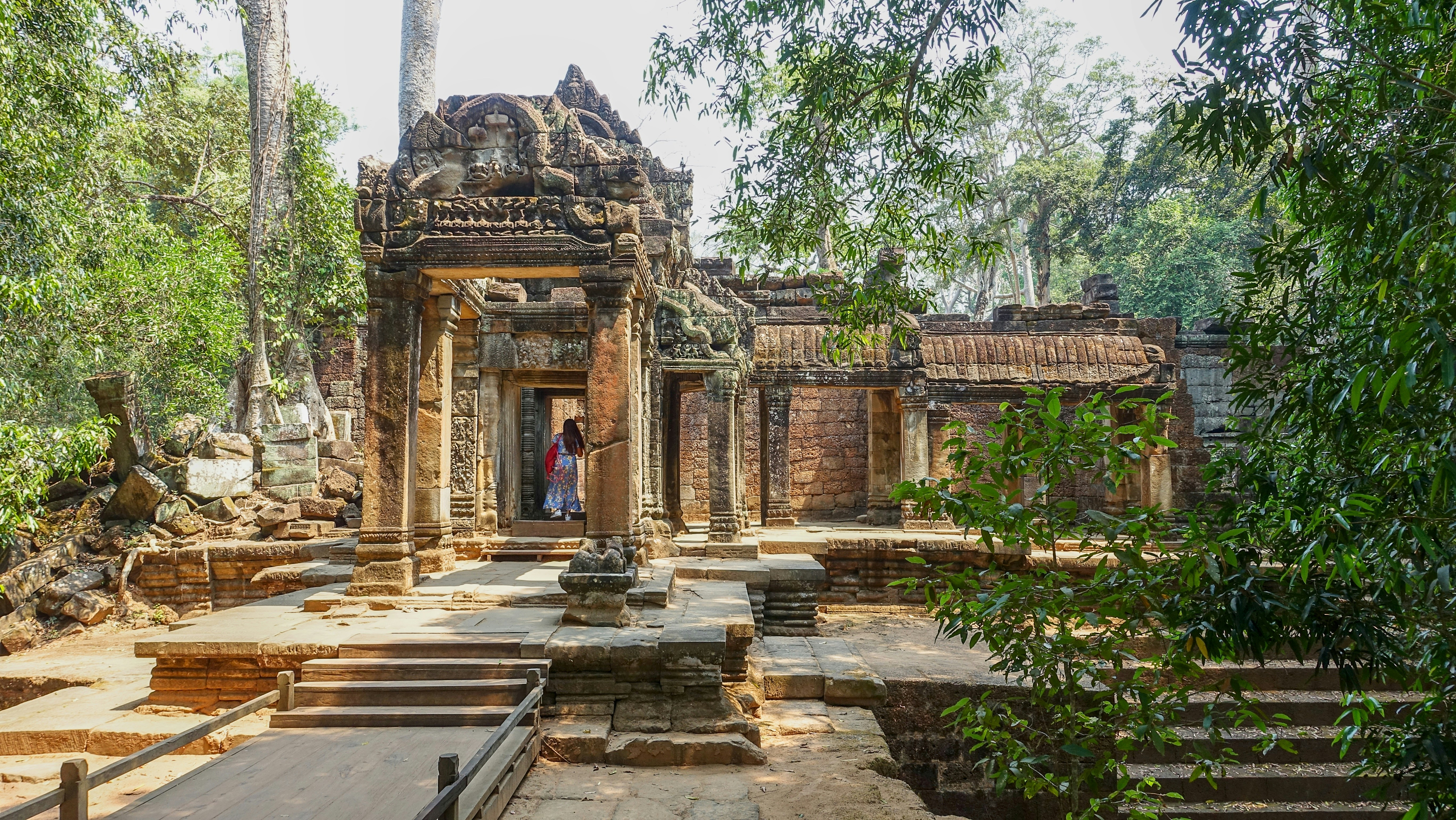 brown concrete building near green trees during daytime, Ta Prohm