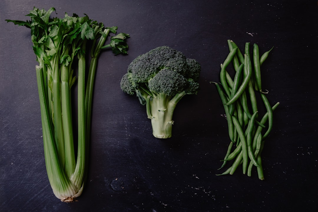 green broccoli on purple textile