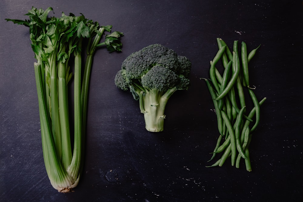 green broccoli on purple textile