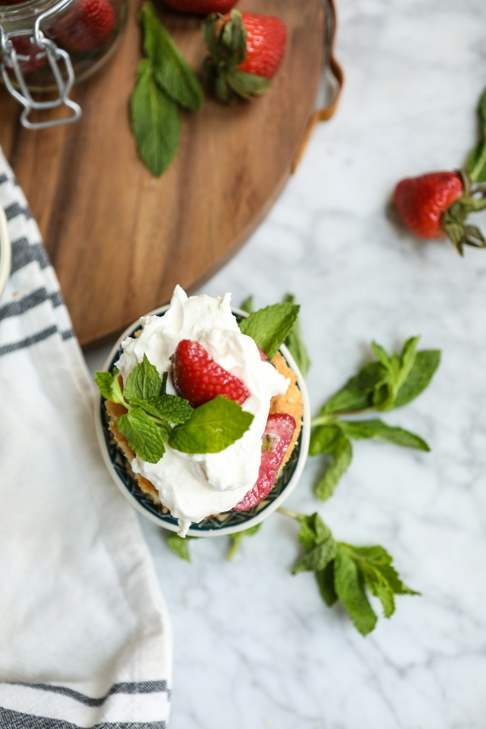 strawberry fruit on white ceramic bowl
