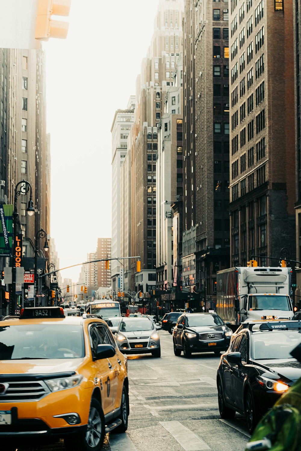 cars on road in city during daytime