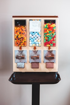 assorted candies in black plastic container