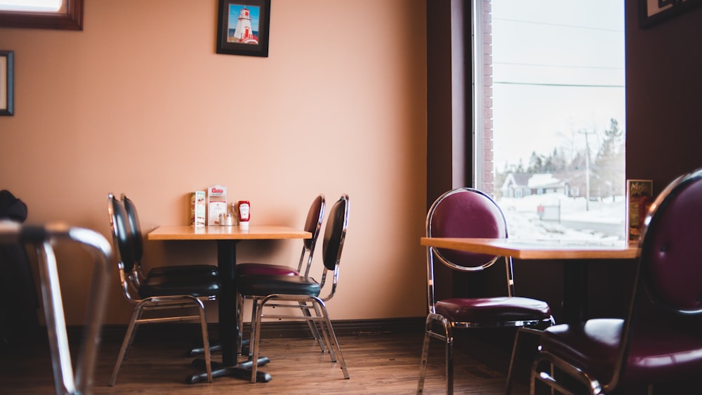 black wooden table with chairs