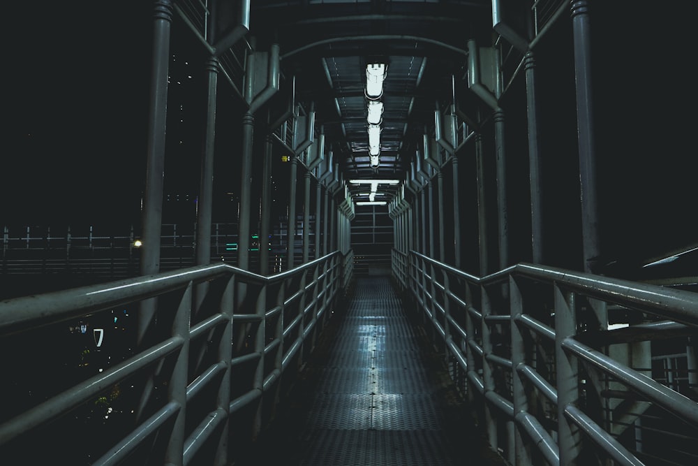 black metal tunnel during night time