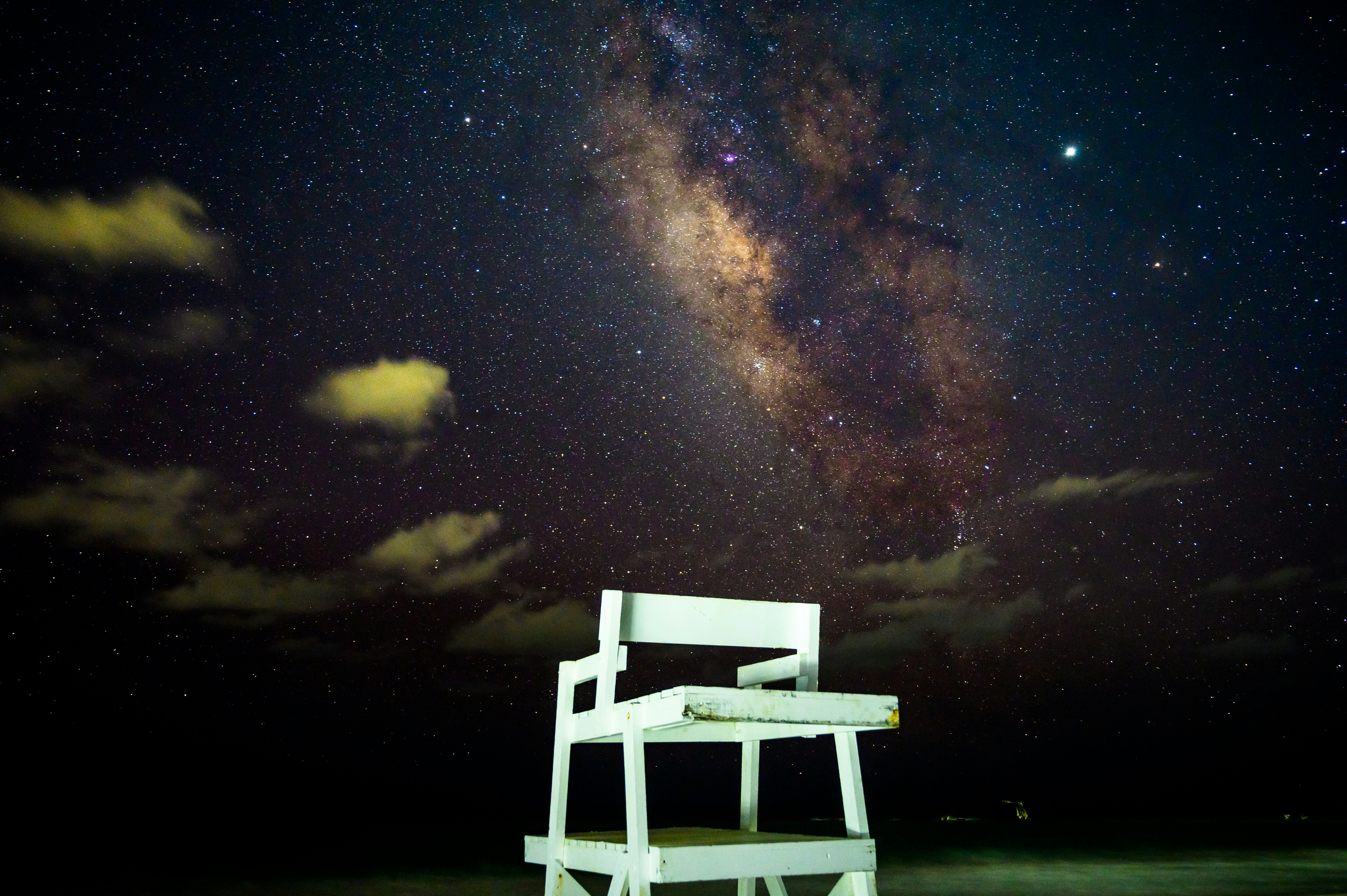 white wooden chair under starry night, starry skies!