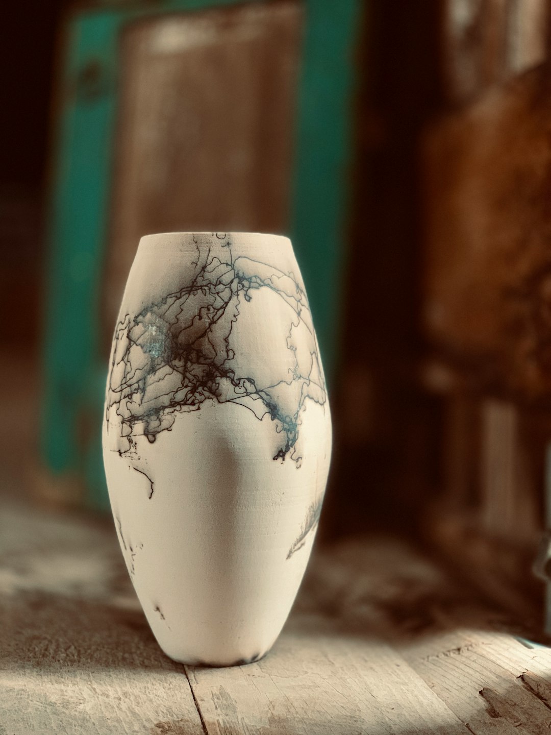 white and black floral ceramic vase