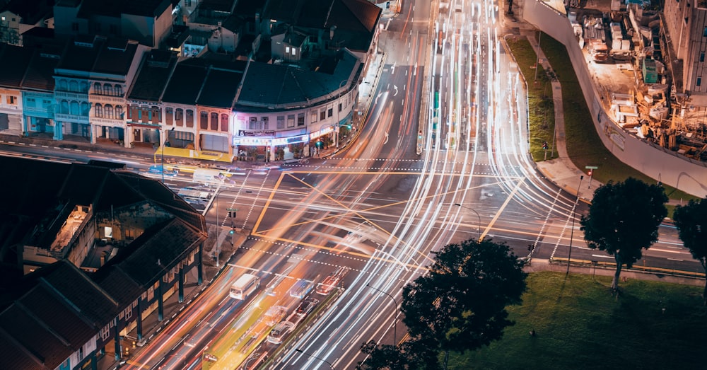 time lapse photography of cars on road during night time