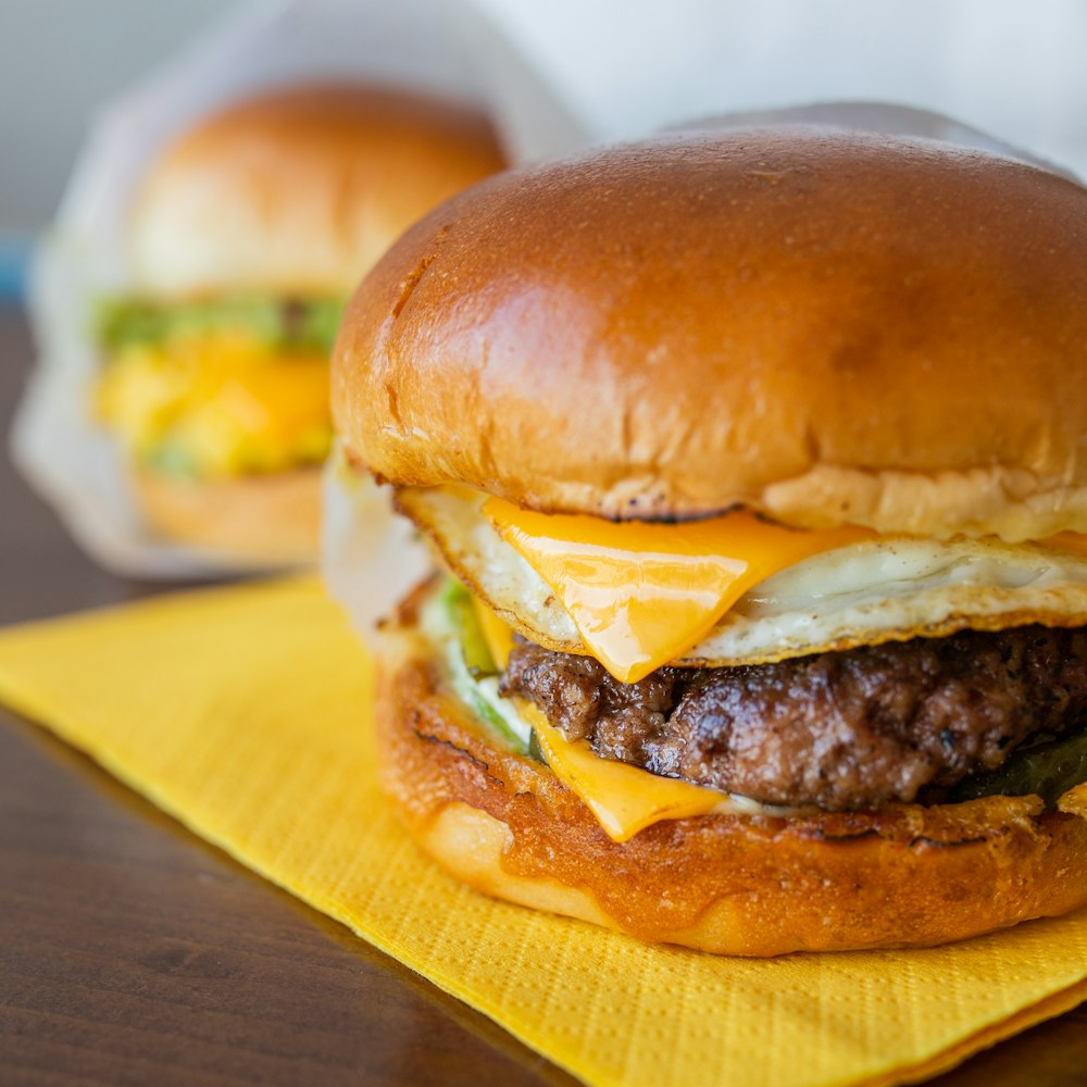 burger on brown wooden table