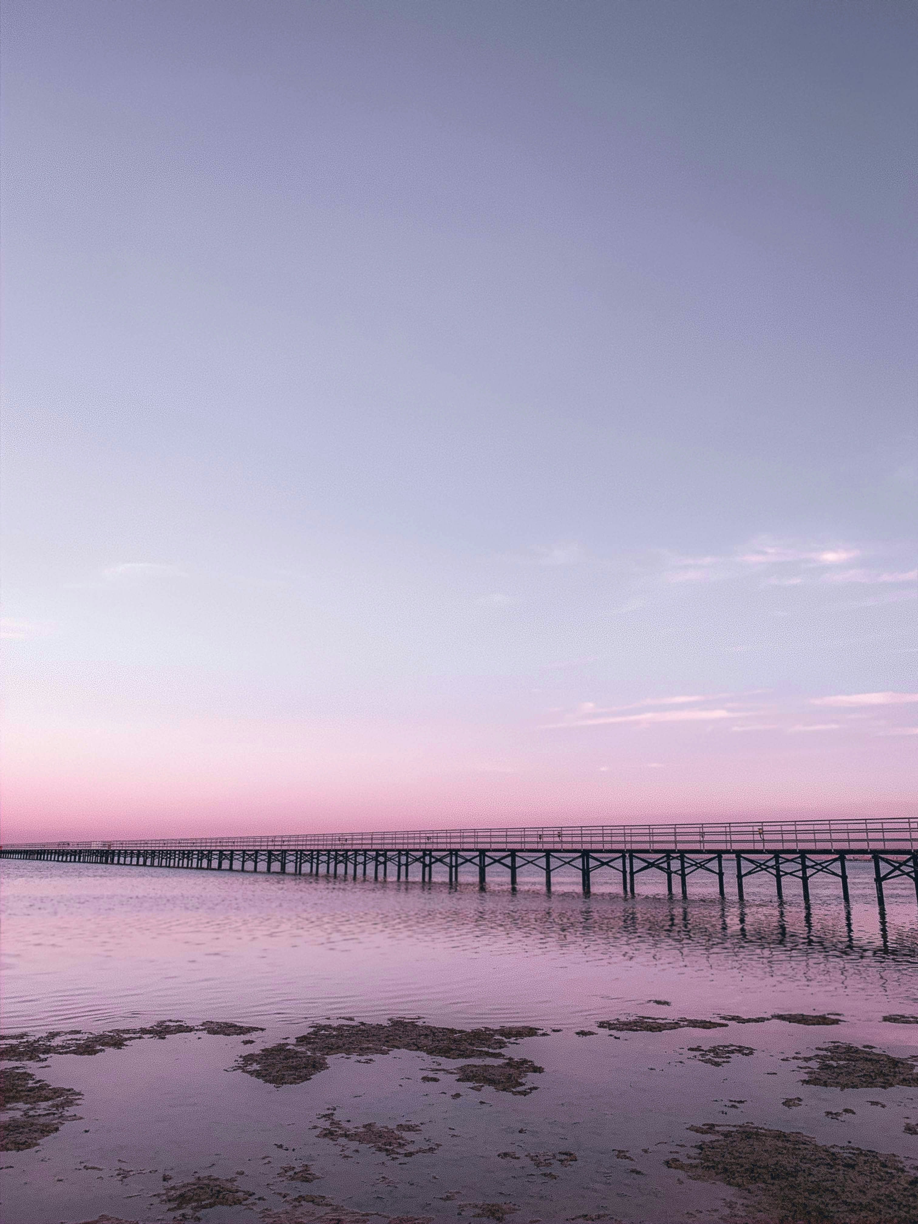 Brown wooden dock on sea under white clouds during daytime photo – Free ...