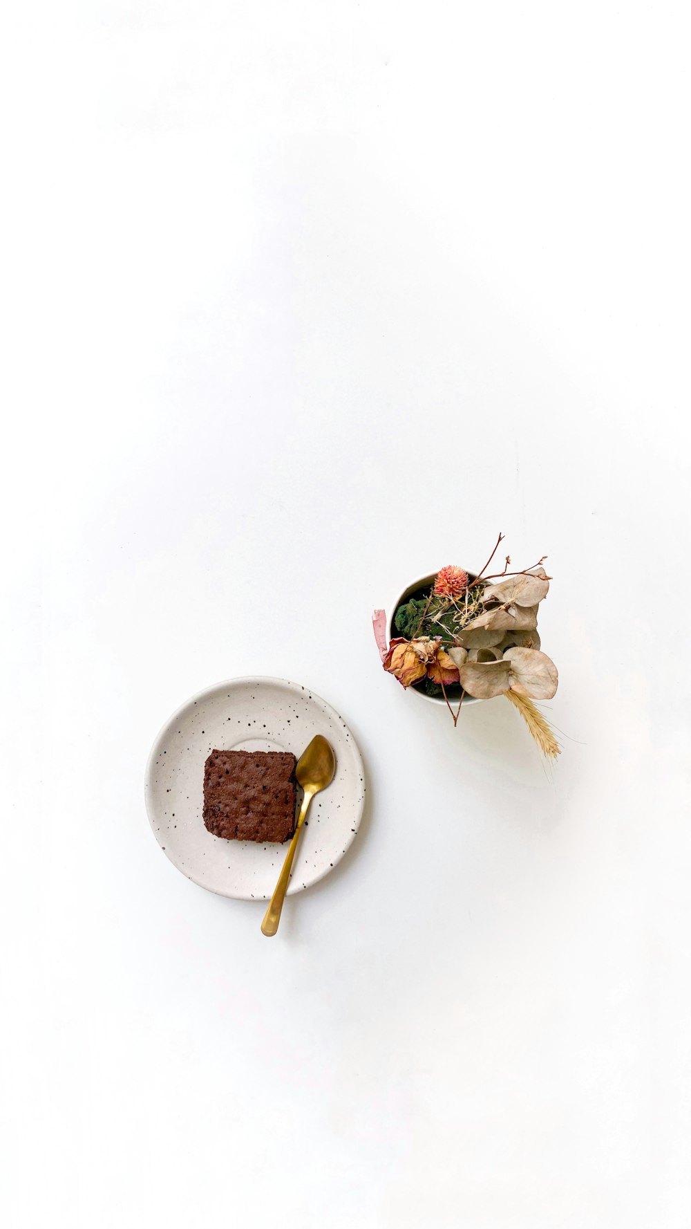 sliced strawberry and chocolate cake on white ceramic plate