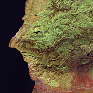 A detailed satellite image showing terrain deformation with overlayed data points.